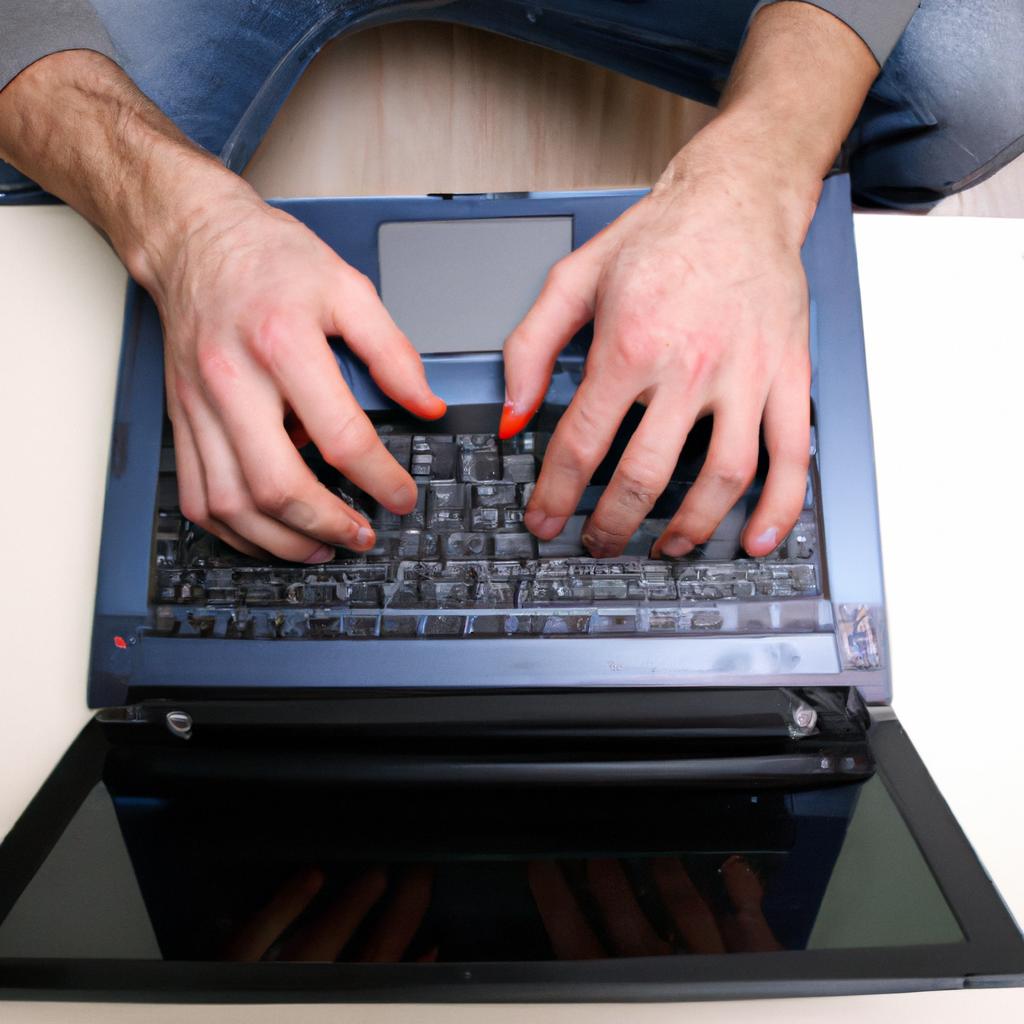 Man typing on laptop, networking